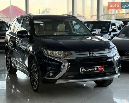 Синий Мицубиси Аутлендер, объемом двигателя 3 л и пробегом 144 тыс. км за 15940 $, фото 2 на Automoto.ua