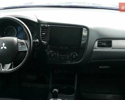 Синій Міцубісі Аутлендер, об'ємом двигуна 2.36 л та пробігом 161 тис. км за 14400 $, фото 13 на Automoto.ua