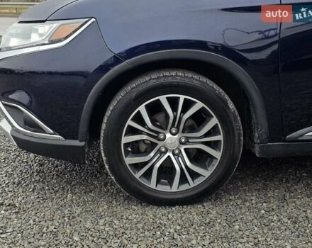 Синий Мицубиси Аутлендер, объемом двигателя 2.4 л и пробегом 134 тыс. км за 13999 $, фото 11 на Automoto.ua