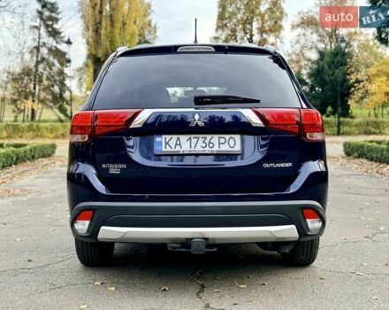 Синий Мицубиси Аутлендер, объемом двигателя 3 л и пробегом 123 тыс. км за 15900 $, фото 5 на Automoto.ua