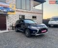 Синій Міцубісі Аутлендер, об'ємом двигуна 2.4 л та пробігом 233 тис. км за 12200 $, фото 1 на Automoto.ua