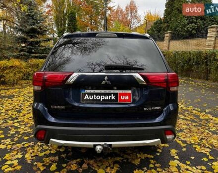 Синий Мицубиси Аутлендер, объемом двигателя 2 л и пробегом 238 тыс. км за 14940 $, фото 6 на Automoto.ua