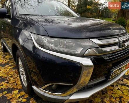 Синий Мицубиси Аутлендер, объемом двигателя 2 л и пробегом 238 тыс. км за 14940 $, фото 3 на Automoto.ua