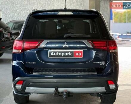 Синий Мицубиси Аутлендер, объемом двигателя 3 л и пробегом 144 тыс. км за 15940 $, фото 6 на Automoto.ua