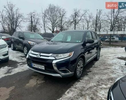 Синий Мицубиси Аутлендер, объемом двигателя 2.36 л и пробегом 195 тыс. км за 13450 $, фото 2 на Automoto.ua