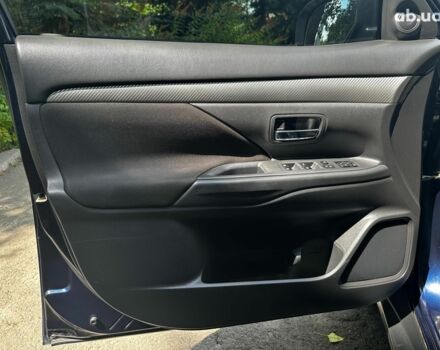 Синій Міцубісі Аутлендер, об'ємом двигуна 2 л та пробігом 238 тис. км за 15990 $, фото 8 на Automoto.ua