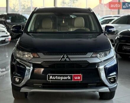 Синий Мицубиси Аутлендер, объемом двигателя 3 л и пробегом 144 тыс. км за 15940 $, фото 1 на Automoto.ua