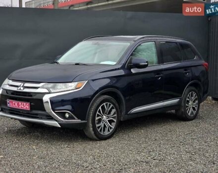 Синий Мицубиси Аутлендер, объемом двигателя 2.4 л и пробегом 134 тыс. км за 13999 $, фото 4 на Automoto.ua