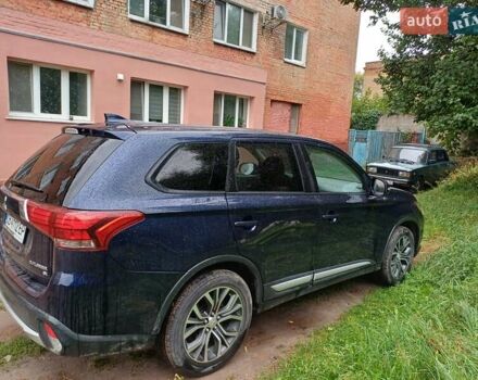 Синий Мицубиси Аутлендер, объемом двигателя 2.42 л и пробегом 135 тыс. км за 17000 $, фото 6 на Automoto.ua