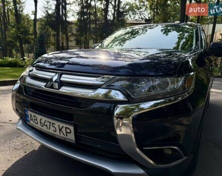 Синий Мицубиси Аутлендер, объемом двигателя 2.4 л и пробегом 102 тыс. км за 15000 $, фото 5 на Automoto.ua
