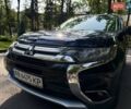 Синий Мицубиси Аутлендер, объемом двигателя 2.4 л и пробегом 102 тыс. км за 15000 $, фото 5 на Automoto.ua