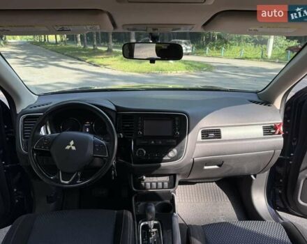 Синий Мицубиси Аутлендер, объемом двигателя 2.4 л и пробегом 102 тыс. км за 15000 $, фото 19 на Automoto.ua