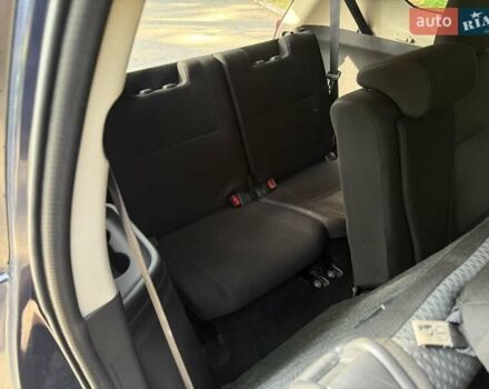 Синий Мицубиси Аутлендер, объемом двигателя 2.4 л и пробегом 102 тыс. км за 15000 $, фото 2 на Automoto.ua