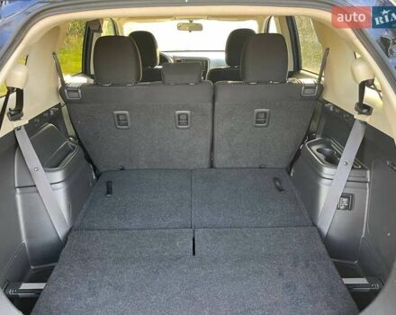 Синий Мицубиси Аутлендер, объемом двигателя 2.4 л и пробегом 221 тыс. км за 12300 $, фото 18 на Automoto.ua