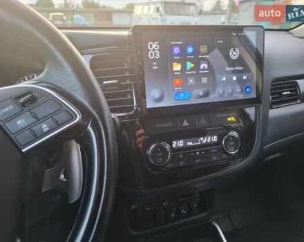 Синий Мицубиси Аутлендер, объемом двигателя 3 л и пробегом 93 тыс. км за 21500 $, фото 24 на Automoto.ua