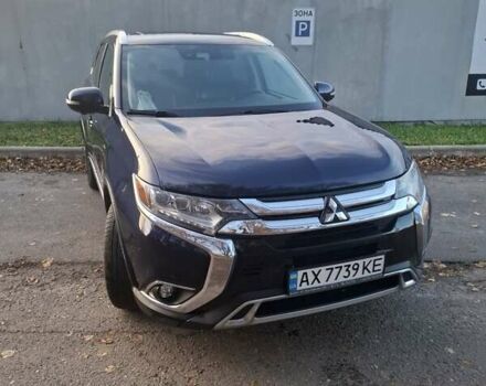 Синий Мицубиси Аутлендер, объемом двигателя 3 л и пробегом 93 тыс. км за 21500 $, фото 1 на Automoto.ua
