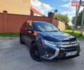 Синий Мицубиси Аутлендер, объемом двигателя 2.36 л и пробегом 109 тыс. км за 13999 $, фото 1 на Automoto.ua
