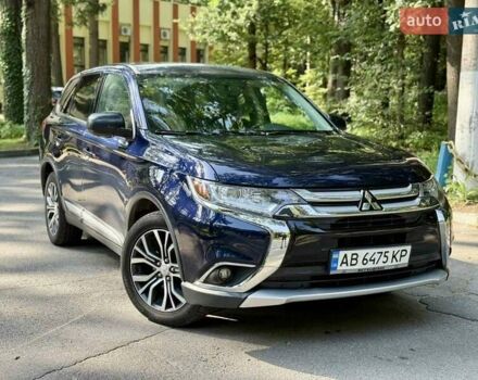 Синий Мицубиси Аутлендер, объемом двигателя 2.4 л и пробегом 102 тыс. км за 15000 $, фото 18 на Automoto.ua