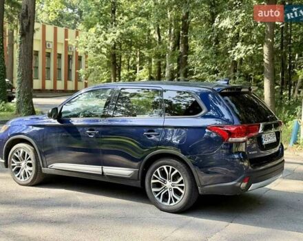 Синий Мицубиси Аутлендер, объемом двигателя 2.4 л и пробегом 102 тыс. км за 15000 $, фото 22 на Automoto.ua