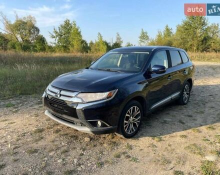 Синий Мицубиси Аутлендер, объемом двигателя 2.4 л и пробегом 221 тыс. км за 12300 $, фото 8 на Automoto.ua