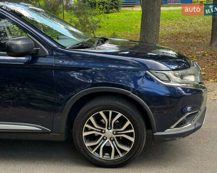 Синий Мицубиси Аутлендер, объемом двигателя 2.4 л и пробегом 144 тыс. км за 15490 $, фото 4 на Automoto.ua