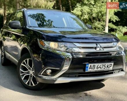 Синий Мицубиси Аутлендер, объемом двигателя 2.4 л и пробегом 102 тыс. км за 15000 $, фото 24 на Automoto.ua