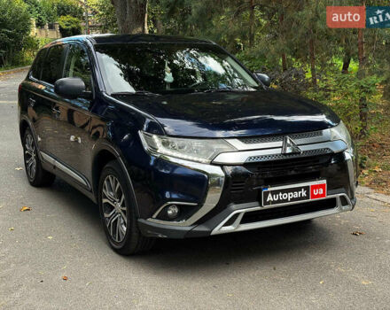 Синий Мицубиси Аутлендер, объемом двигателя 2.4 л и пробегом 144 тыс. км за 15490 $, фото 2 на Automoto.ua