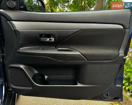 Синий Мицубиси Аутлендер, объемом двигателя 2.4 л и пробегом 144 тыс. км за 15490 $, фото 25 на Automoto.ua