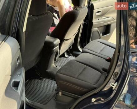 Синий Мицубиси Аутлендер, объемом двигателя 2.4 л и пробегом 102 тыс. км за 15000 $, фото 16 на Automoto.ua