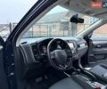 Синій Міцубісі Аутлендер, об'ємом двигуна 2.36 л та пробігом 105 тис. км за 15000 $, фото 3 на Automoto.ua