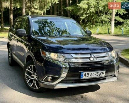 Синий Мицубиси Аутлендер, объемом двигателя 2.4 л и пробегом 102 тыс. км за 15000 $, фото 25 на Automoto.ua