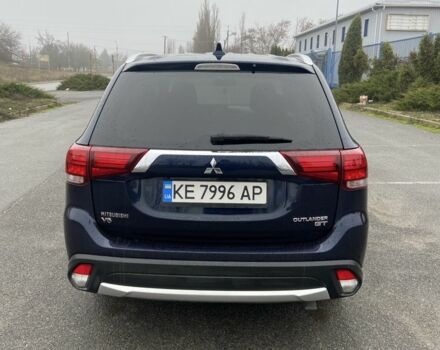 Синий Мицубиси Аутлендер, объемом двигателя 3 л и пробегом 120 тыс. км за 14500 $, фото 3 на Automoto.ua