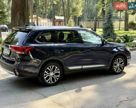 Синий Мицубиси Аутлендер, объемом двигателя 2.4 л и пробегом 102 тыс. км за 15000 $, фото 21 на Automoto.ua