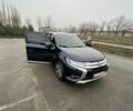 Синий Мицубиси Аутлендер, объемом двигателя 3 л и пробегом 120 тыс. км за 14500 $, фото 1 на Automoto.ua