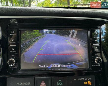 Синий Мицубиси Аутлендер, объемом двигателя 2.4 л и пробегом 144 тыс. км за 15490 $, фото 13 на Automoto.ua