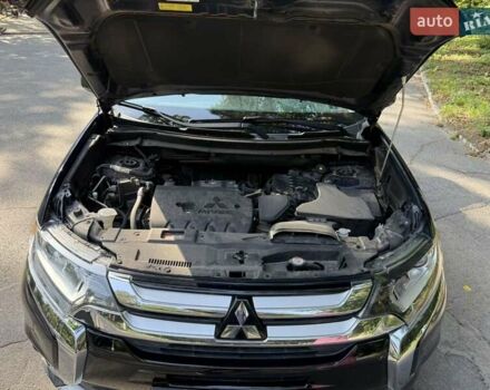 Синий Мицубиси Аутлендер, объемом двигателя 2.4 л и пробегом 102 тыс. км за 15000 $, фото 7 на Automoto.ua