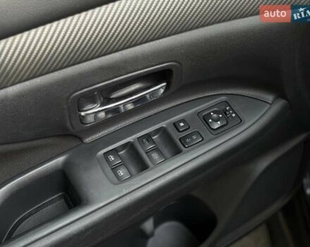 Синий Мицубиси Аутлендер, объемом двигателя 2.4 л и пробегом 102 тыс. км за 15000 $, фото 12 на Automoto.ua