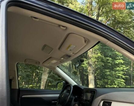 Синий Мицубиси Аутлендер, объемом двигателя 2.4 л и пробегом 102 тыс. км за 15000 $, фото 8 на Automoto.ua