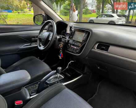 Синий Мицубиси Аутлендер, объемом двигателя 2.4 л и пробегом 144 тыс. км за 15490 $, фото 24 на Automoto.ua