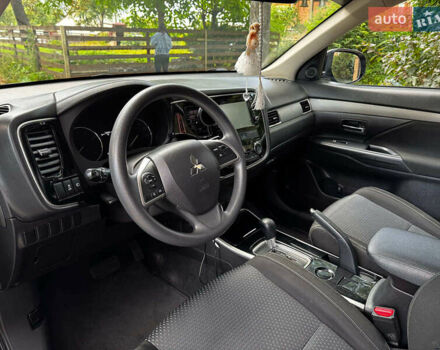 Синий Мицубиси Аутлендер, объемом двигателя 2.4 л и пробегом 144 тыс. км за 15490 $, фото 10 на Automoto.ua