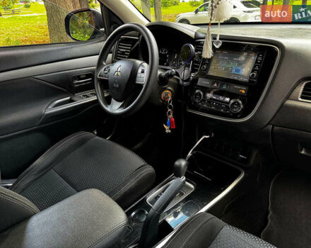 Синий Мицубиси Аутлендер, объемом двигателя 2.4 л и пробегом 144 тыс. км за 15490 $, фото 26 на Automoto.ua