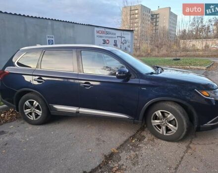 Синий Мицубиси Аутлендер, объемом двигателя 3 л и пробегом 93 тыс. км за 21500 $, фото 3 на Automoto.ua