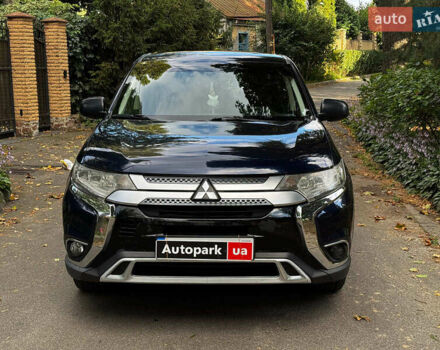 Синий Мицубиси Аутлендер, объемом двигателя 2.4 л и пробегом 144 тыс. км за 15490 $, фото 3 на Automoto.ua