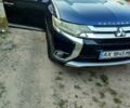Синій Міцубісі Аутлендер, об'ємом двигуна 2.4 л та пробігом 126 тис. км за 17500 $, фото 1 на Automoto.ua