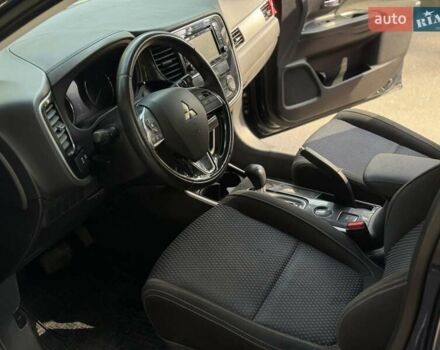 Синий Мицубиси Аутлендер, объемом двигателя 2.4 л и пробегом 102 тыс. км за 15000 $, фото 13 на Automoto.ua