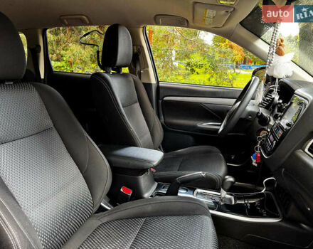 Синий Мицубиси Аутлендер, объемом двигателя 2.4 л и пробегом 144 тыс. км за 15490 $, фото 27 на Automoto.ua