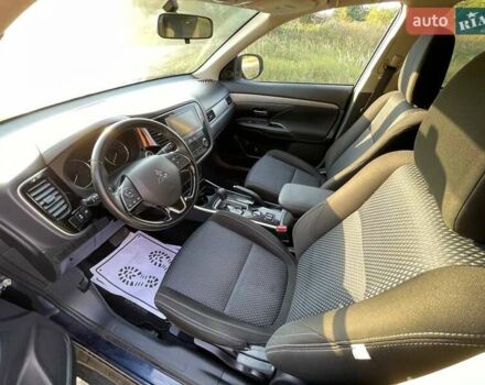 Синий Мицубиси Аутлендер, объемом двигателя 2.4 л и пробегом 221 тыс. км за 12300 $, фото 12 на Automoto.ua