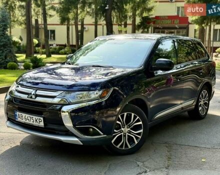 Синий Мицубиси Аутлендер, объемом двигателя 2.4 л и пробегом 102 тыс. км за 15000 $, фото 15 на Automoto.ua