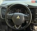 Синий Мицубиси Аутлендер, объемом двигателя 2.4 л и пробегом 102 тыс. км за 15000 $, фото 3 на Automoto.ua