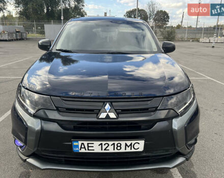 Синий Мицубиси Аутлендер, объемом двигателя 2.36 л и пробегом 150 тыс. км за 15500 $, фото 2 на Automoto.ua